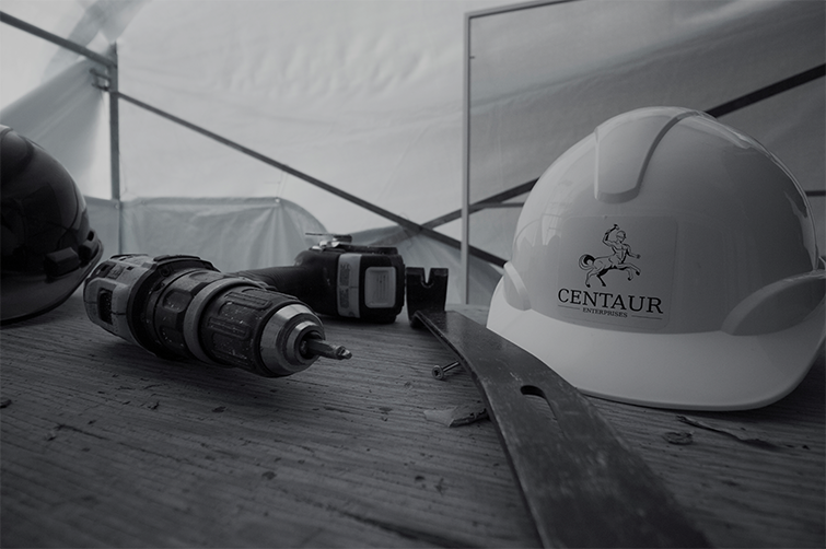 Image of a white construction helmet with Centaur Enterprises logo.